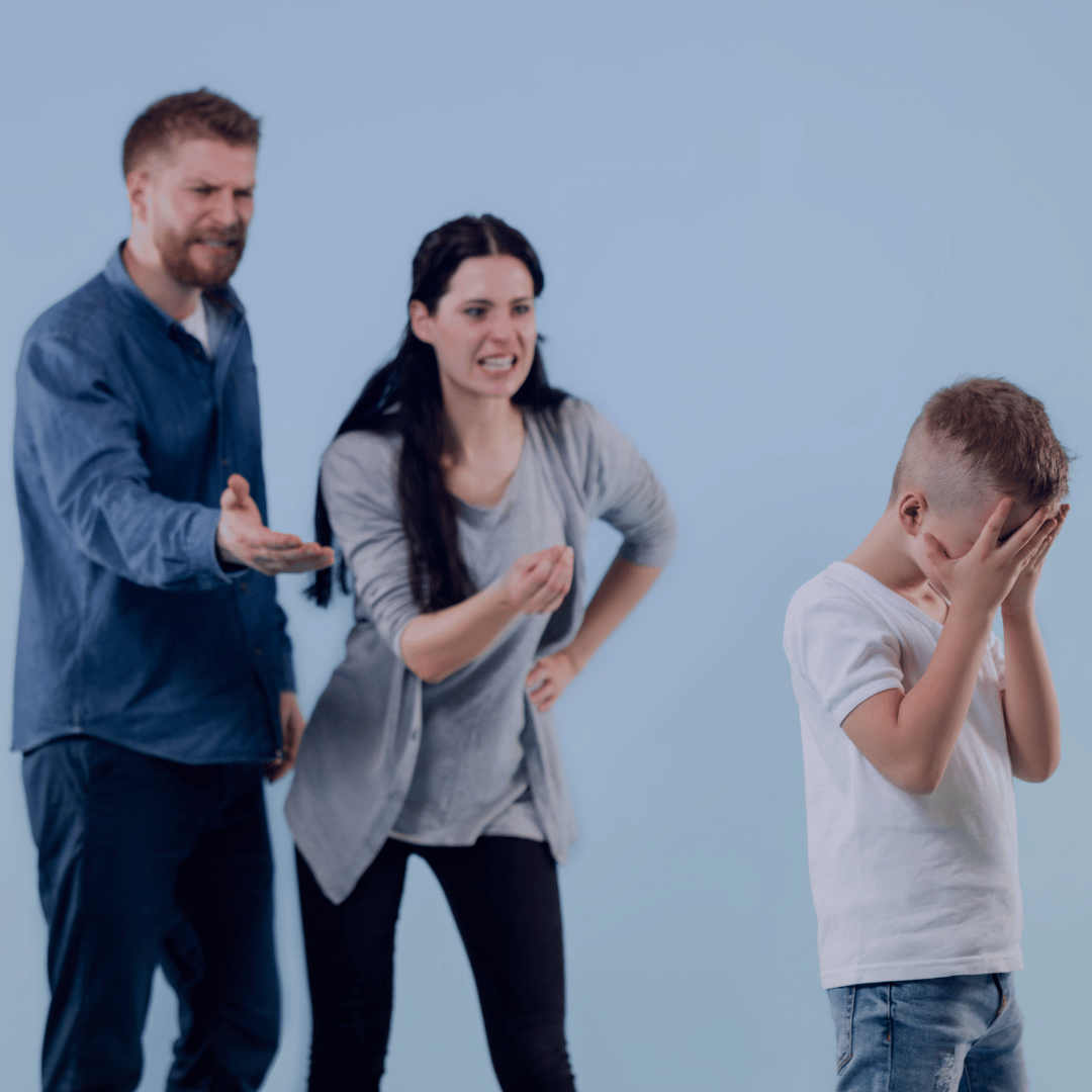 Parents scolding a child